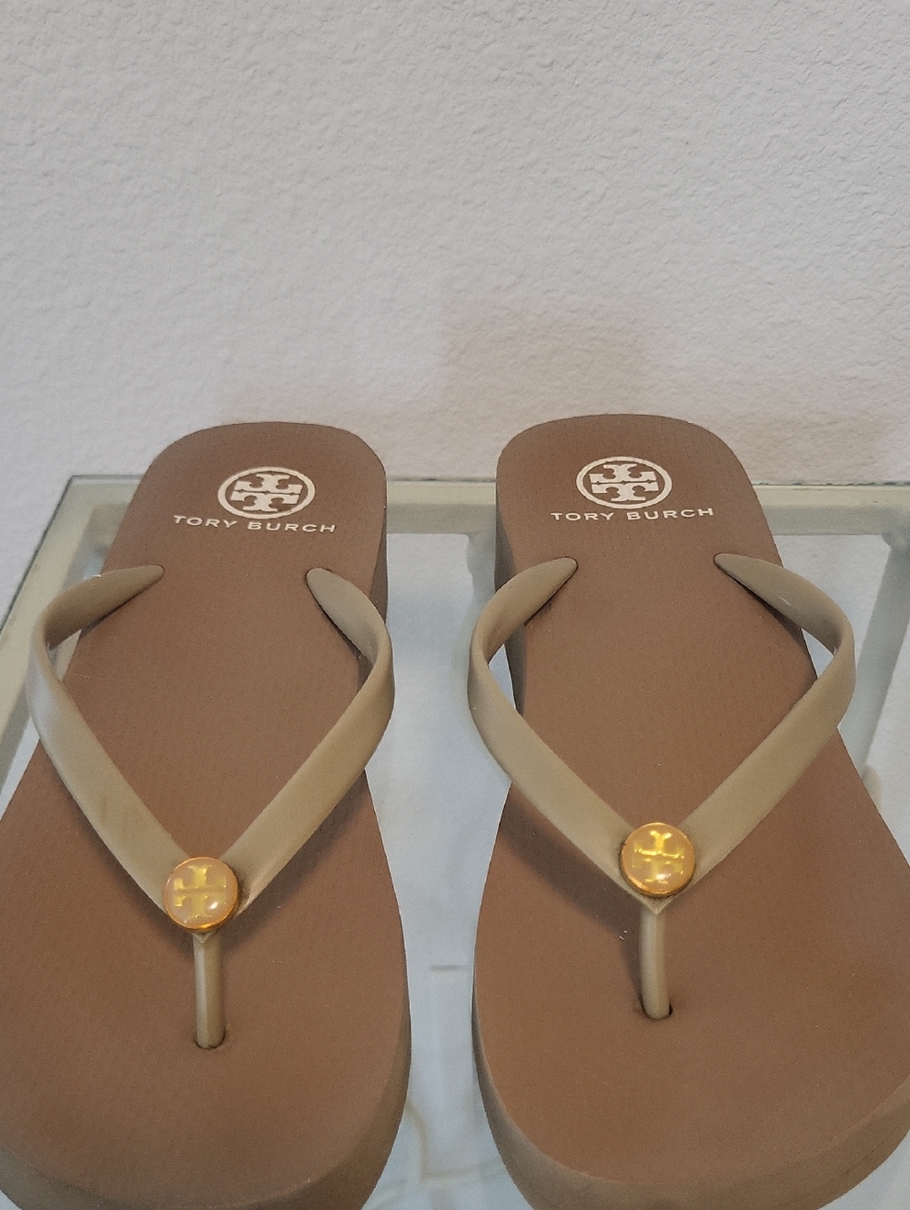 Tory Burch Brown Footbed Flip Flops with Tan Straps and Gold Medallions